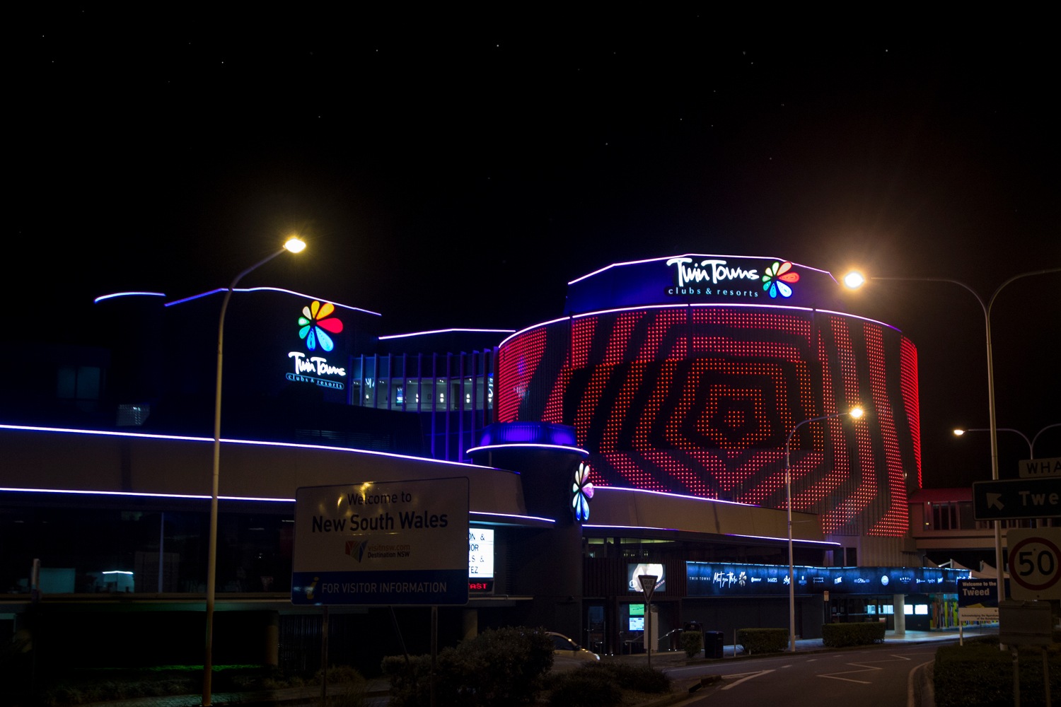 Twin Towns Curved LED Screen Building Facade Custom Digital Signage Solutions